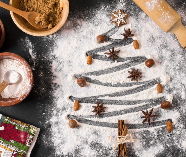 top-view-christmas-tree-shape-with-flour-star-anise_optimized